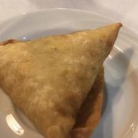 Veggie Sambusa · Pastry shell filled with mixed vegetables such as onion, carrot, peas, green chilies, and th...