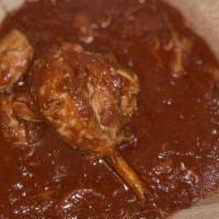 Doro Wot · Seasoned drumstick chicken stew cooked slow with berbere sauce, Mekelesha (special blend of ...