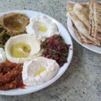 Mix Appetizers · Combination of hummus, babaganoush, eggplant salad, lebni (haydari), acili ezme and staffed ...