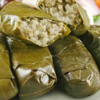 Stuffed Grape Leaves · Yaprak Sarmasi.  Grape leaves staffed with blend of rice, pine nuts, herbs and spices