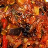 Eggplant With Sauce · Small pieces of eggplants in a moderate spicy sauce of fresh tomatoes, peppers, onions, garl...