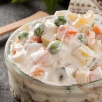 Russian Salad · Green peas, potatoes, carrots and diced cucumbers mixed with mayonnaise