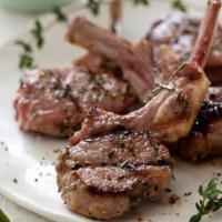 Lamb Chops · Baby lamb chops slightly seasoned with spices and herbs and grilled to order. Served with ri...