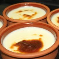 Rice Pudding · Oven-baked pudding made with milk, rice and sugar