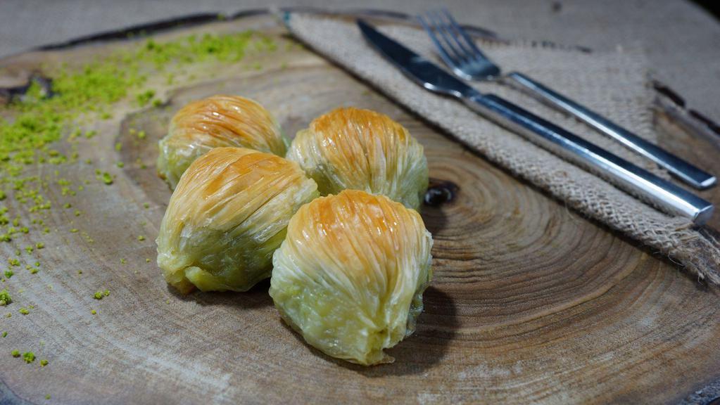 Mussel Baklava · Layers of filo pastry, filled with pistachio and butter cream
