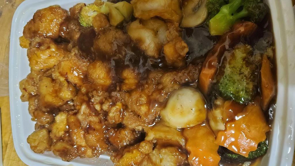 Dragon And Phoenix · Szechuan mixed vegetable shrimp and general Tso's chicken. Spicy.