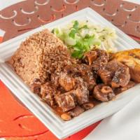 Oxtail  Large Meal · Braised in a hearty brown stew loaded with carrots and butter beans. Savory and comforting s...
