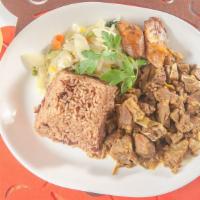 Curried Goat Large Meal · Delicious Jamaican classic slow cooked in spicy curry sauce.