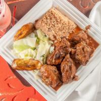 Brown Stew Chicken Large Meal · Chicken marinated in house spices, stewed and simmered in brown stew gravy with carrots and ...