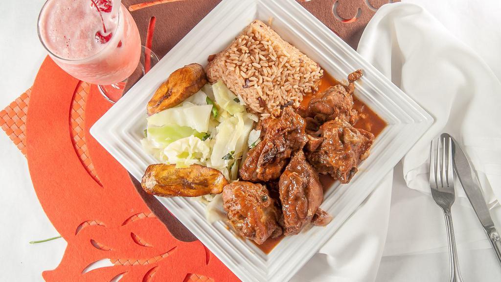 Brown Stew Chicken Large Meal · Chicken marinated in house spices, stewed and simmered in brown stew gravy with carrots and onions.