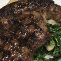 Grilled Rib Eye Steak · 12oz Steak, mashed potatoes & vegetables