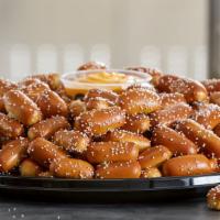 Large Rivet Party Tray · Pair your Large Size Rivets Party Tray with any 3 of our wide assortment of Pretzel Dips. Th...