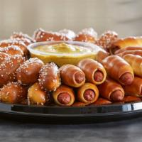 Mini Dogs & Rivets Party Tray · A winning pair: 36 all beef mini pretzel dogs and 64 bite-sized rivets, plus any 2 of our 8 ...