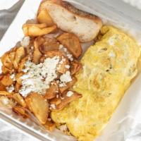 Meat Omelette · Greek sausage (pork), bacon, ham, served with Greek homestyle fries and bread.