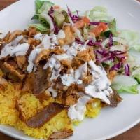 Döner Rice Plate · Choice of meat, rice, side salad with yogurt sauce & salad dressing