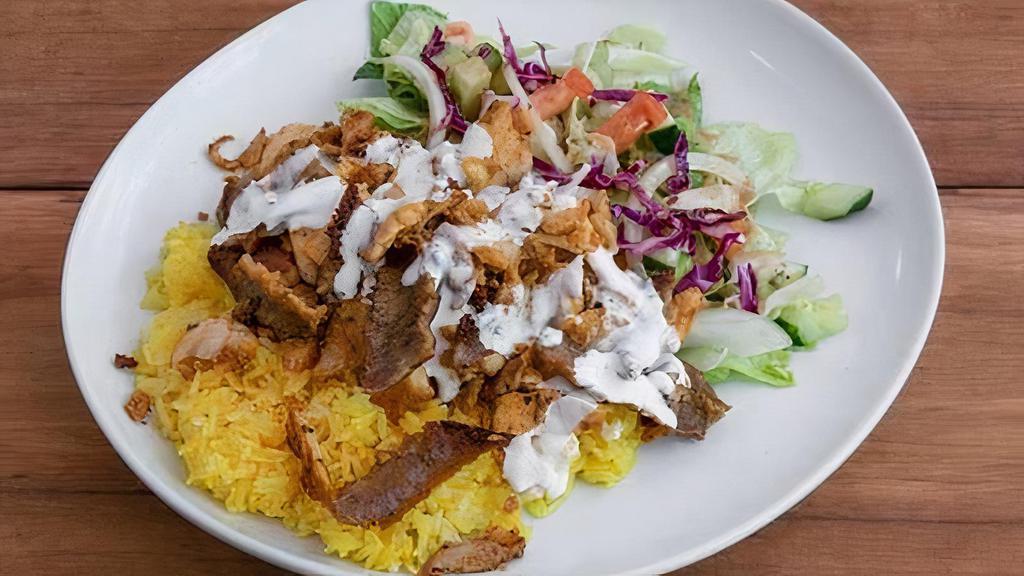 Döner Rice Plate · Choice of meat, rice, side salad with yogurt sauce & salad dressing