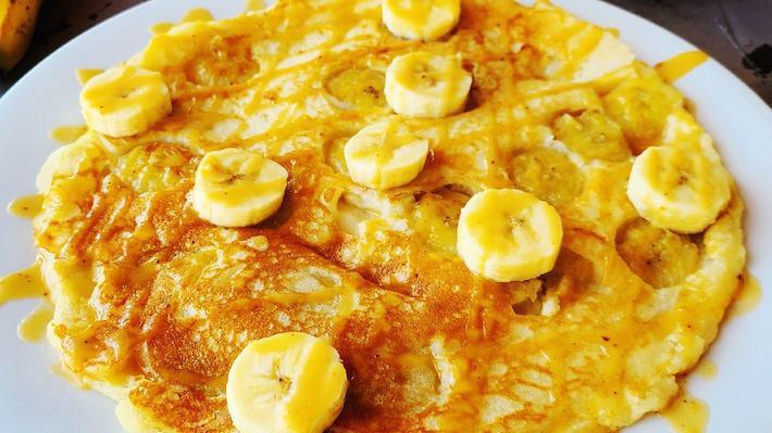 Banana Pancake · Banana pancake with chantilly sauce.