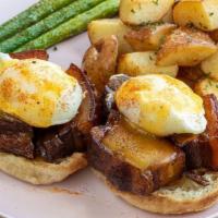 Bae Benedict · Seared pork belly, English muffin, poached eggs, bacon Hollandaise.