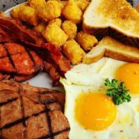 Big Breakfast Combo · Portuguese sausage, spam, bacon, rice or house potatoes, two eggs any style.