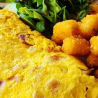 Bacon Cheddar Omelet · Cheddar cheese, bacon, onion served with choice of rice, potato, or hash brown.