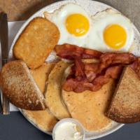 Breakfast Platter · Two eggs any style, choice of bacon, sausage, ham, or pork roll and choice of pancakes or Fr...