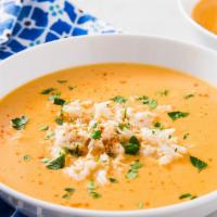 Crab Bisque · Thick and creamy soup.