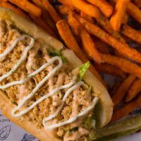 Crab Meat Po' Boy · Bed of po'boy bread, fresh lettucce and tomato slices, one the top we sprinkle a thick layer...