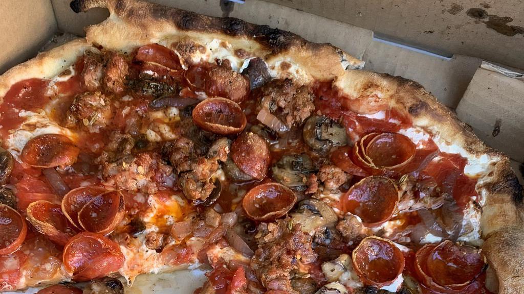 Sonny Supreme · Fresh mozzarella, herbed mushrooms, balsamic red onions, hot fennel sausage, pepperoni and tomato sauce.