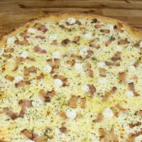 Bacon Bianco · Fresh mozzarella, aged mozzarella, ricotta, bacon, fresh garlic, oregano and calabrian chili...