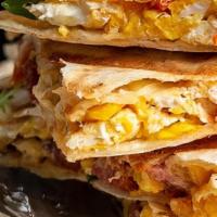 Ranch Quesadilla · Scrambled Eggs, Bacon, Hash Browns, and Pepper Jack Cheese