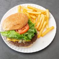 Cheese Burger Deluxe · Served with french fries or onion rings lettuce tomato and pickle.