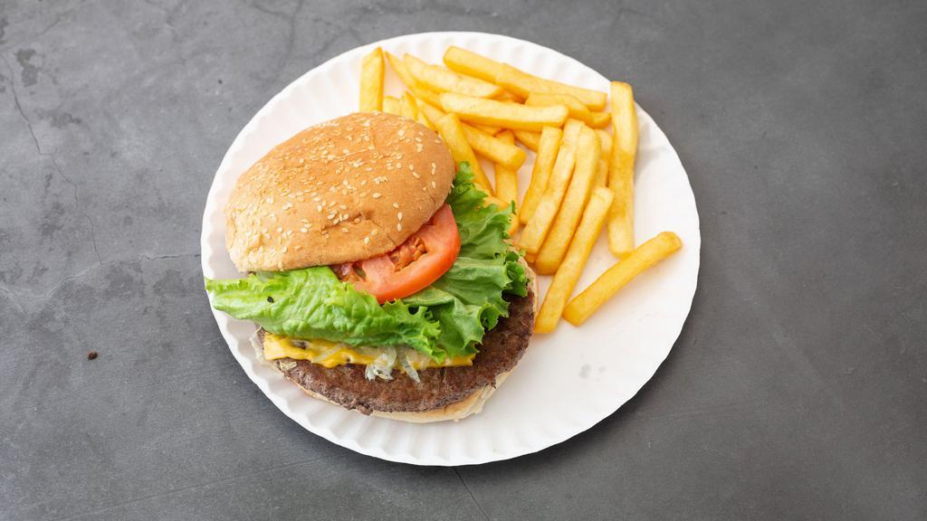 Cheese Burger Deluxe · Served with french fries or onion rings lettuce tomato and pickle.