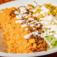 Burrito Or Burrito Bowl · Flour or whole wheat tortilla, Mexican rice, beans, lettuce pico de gallo, sour cream, chees...
