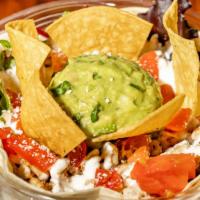 Taco Salad (Soft) · Lettuce, tomato, beans, guacamole, cotija cheese, sour cream. Hard shell for an extra charge.