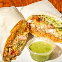 Burrito · Flour tortilla, Mexican rice, beans, lettuce, corn, sour cream, pico de gallo and cheese.