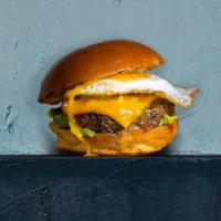 Brekkie Burger · House-made, seasoned patty perfectly cooked to medium, topped with bacon, fried egg, avocado...