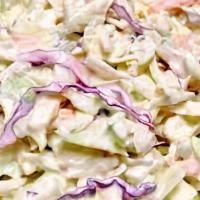 Take It Slaw (Cole Slaw) · Fresh cabbage tossed in our house dressing