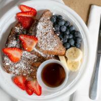 French Toast Platter · Four French toast triangles.