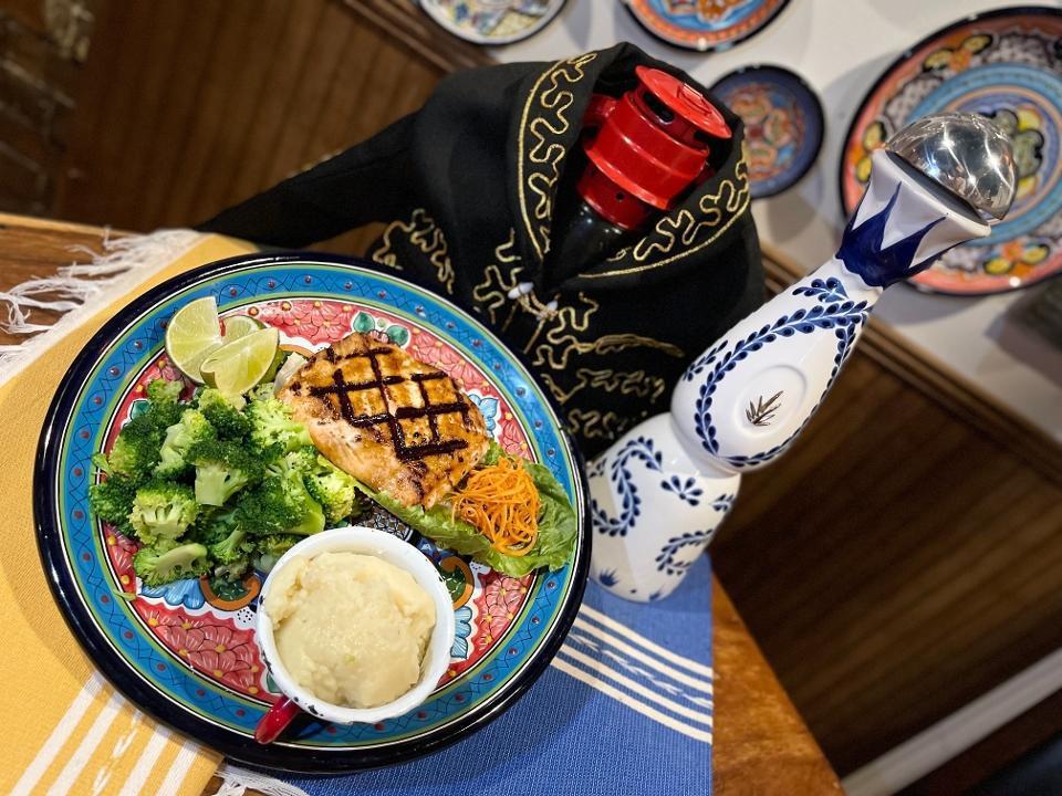Grilled Salmon · Flat iron Salmon served with mashed. potatoes & broccoli with a side of. chipotle sauce.