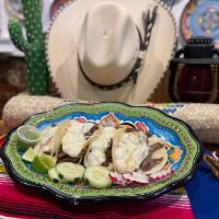 Tacos Oaxaca · Steak with melted Oaxaca cheese,. garnished with cucumber, radish, pico. de gallo & a side o...