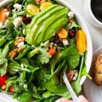 Regina'S Salad · Mixed greens, cherry tomatoes, walnuts, dried cranberries, avocado, gorgonzola cheese with h...