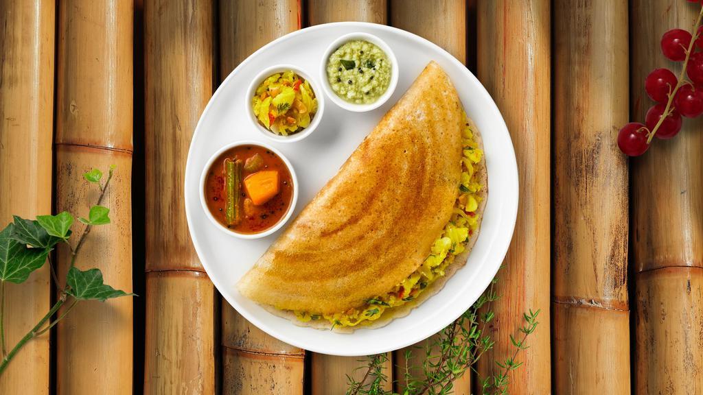 Masala Much Dosa Gallery · Thin crepe made from rice and lentil served with coconut chutney.