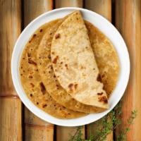 Pirate Paratha · Whole wheat layered bread brushed with butter