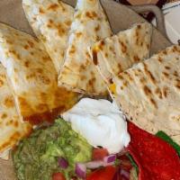 Quesadillas · Salsa, guacamole, sour cream, tortilla chips.