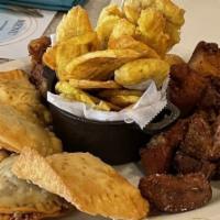 Cuatro Calle / Sampler · Fried Chicken Chunks, Fried Pork Chunks, Tostones & 4 Empanadas