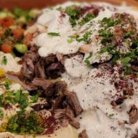Beef Shawarma · Served as a sandwich or a platter.