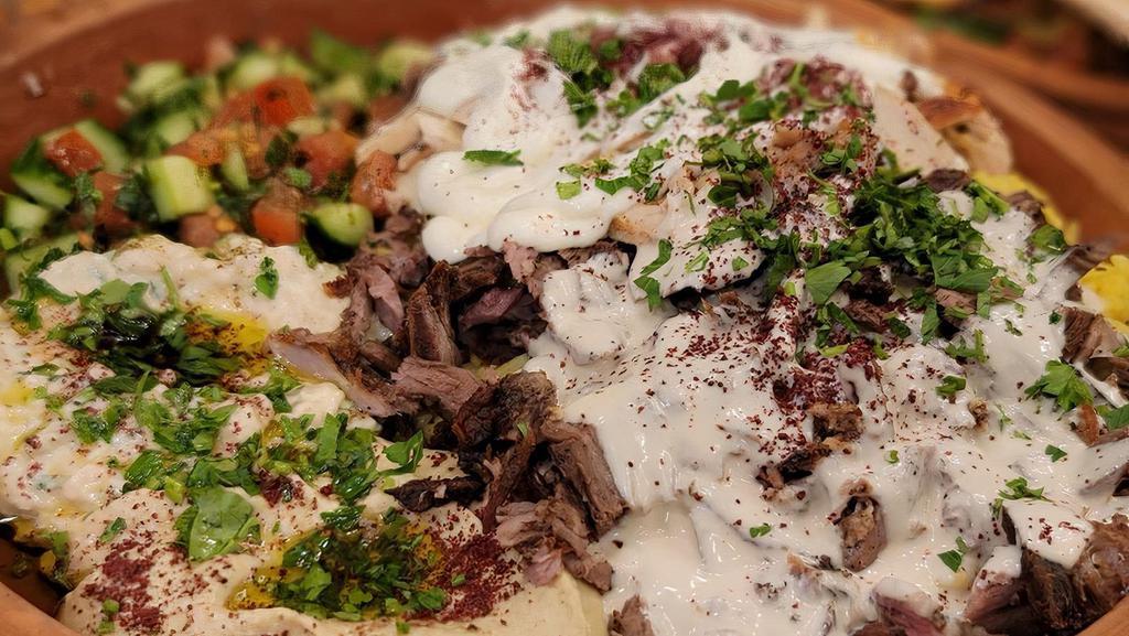 Beef Shawarma · Served as a sandwich or a platter.