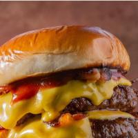 Double Cheeseburger · Delicious Double Cheeseburger freshly prepared and cooked to perfection.