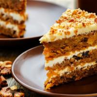 Carrot Cake · Fresh carrot cake with a creamy frosting.
