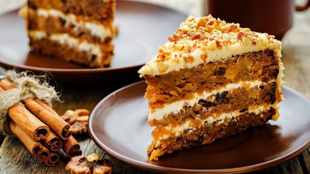 Carrot Cake · Fresh carrot cake with a creamy frosting.